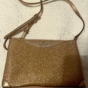 Never used rose gold Kate spade purse